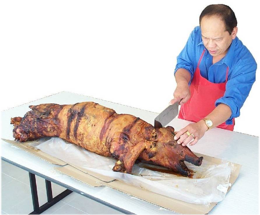Cutting roast pig.jpg